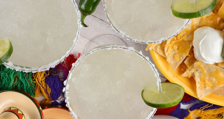 fresh margaritas on festive table top